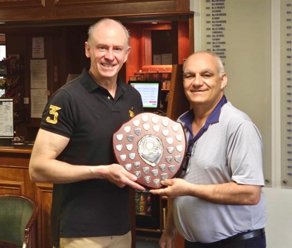 Fitz receiving the Swindle Shield